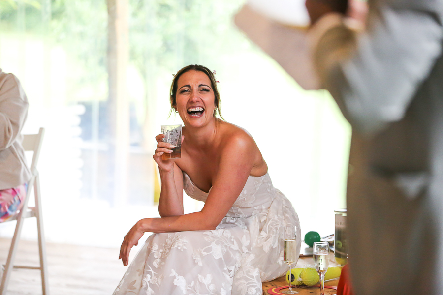 Bride laughing at speech