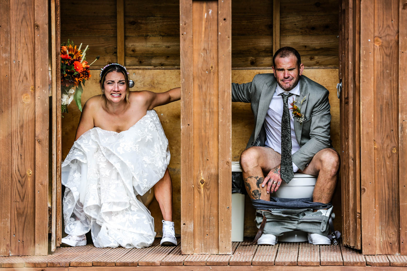 Bride and groom on toilet