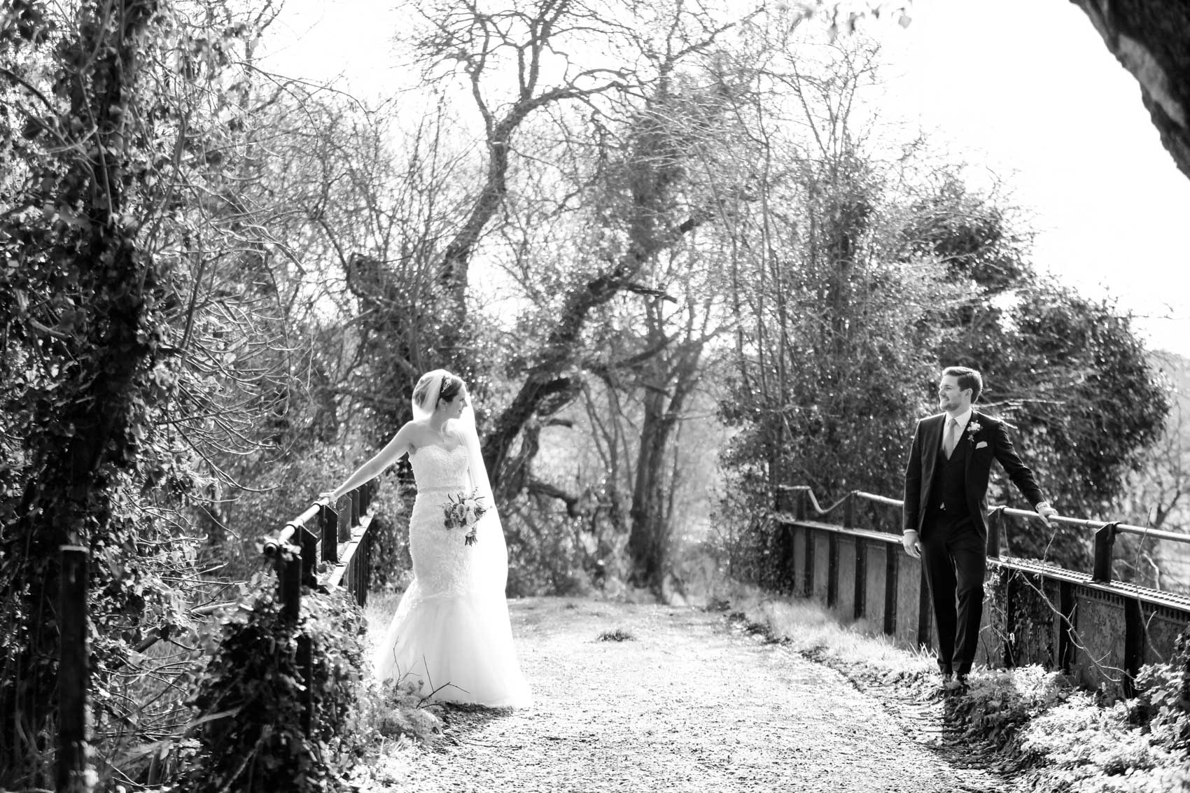 Bride and Groom on a Bridge having a couple shoot