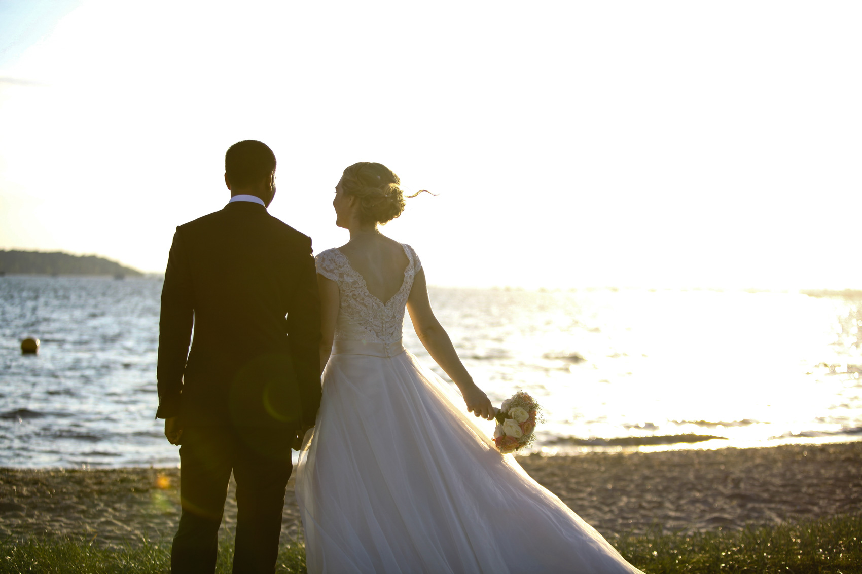 Bride and groom on beach